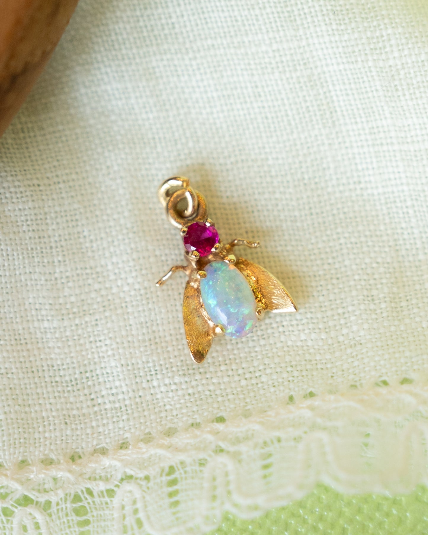 .09 Ruby & Opal Insect Charm in 14k Yellow Gold