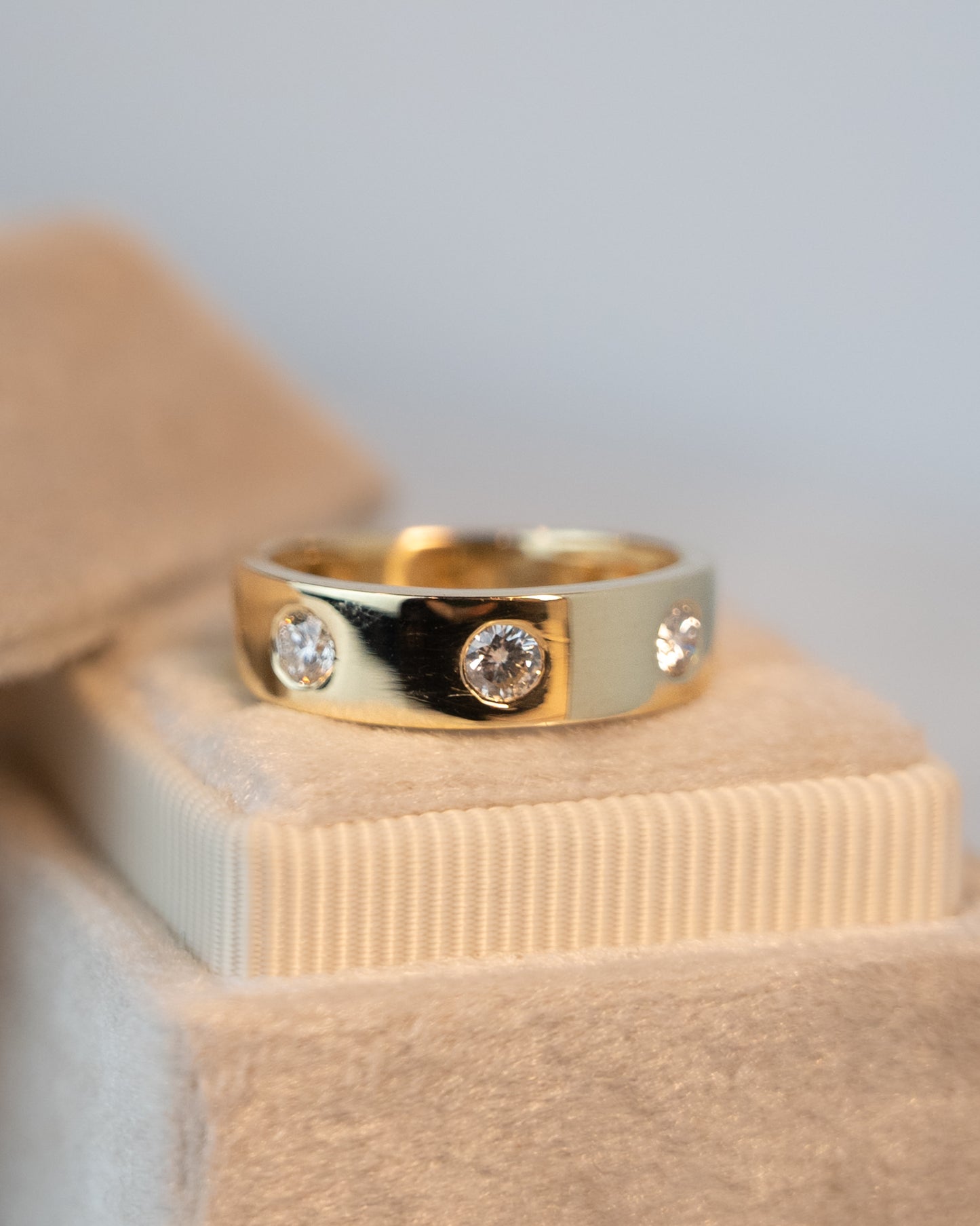 .37 Bezel 3 Stone Diamond Band in 14k Yellow Gold