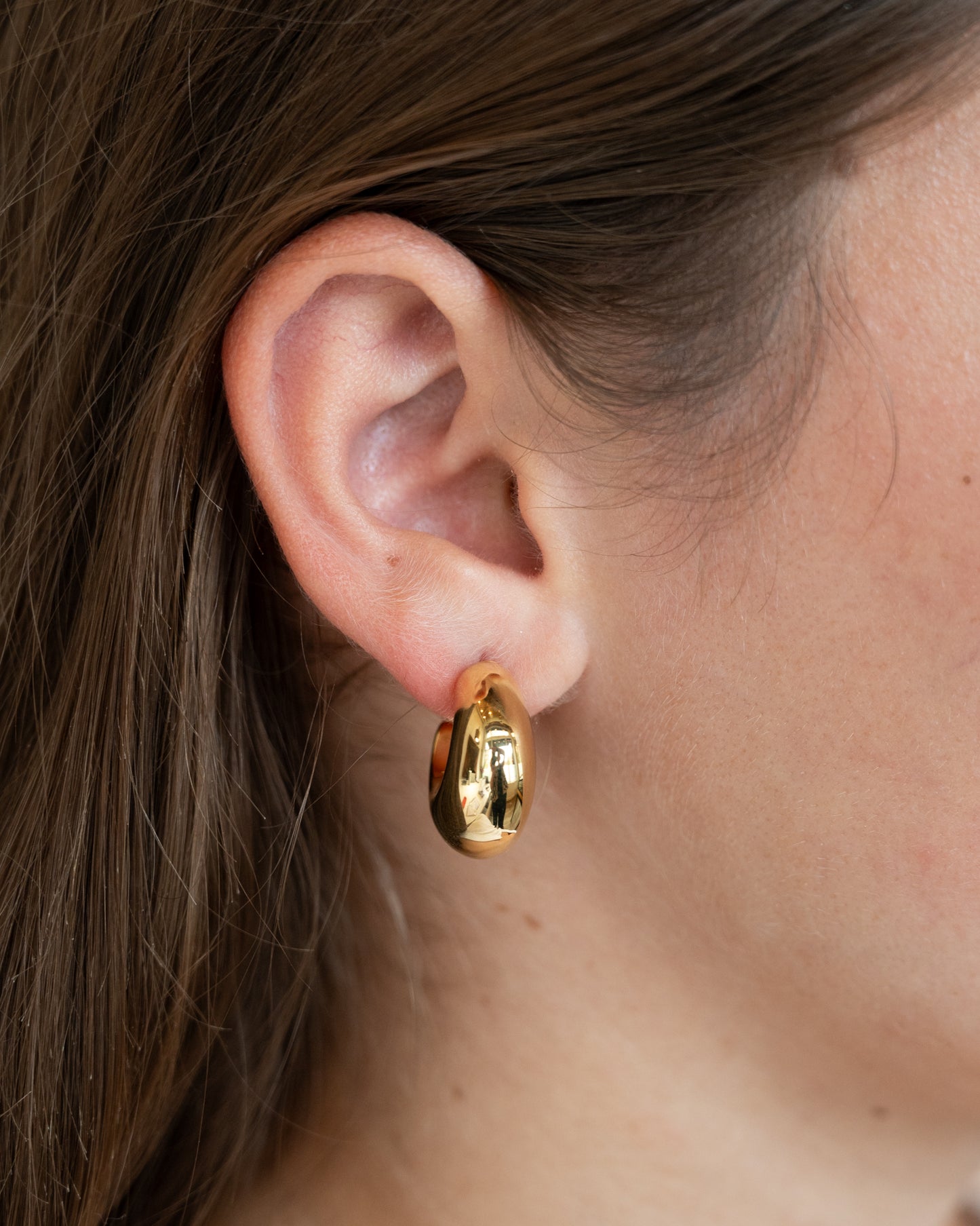 Puffy J Hoop Earrings in 14k Yellow Gold