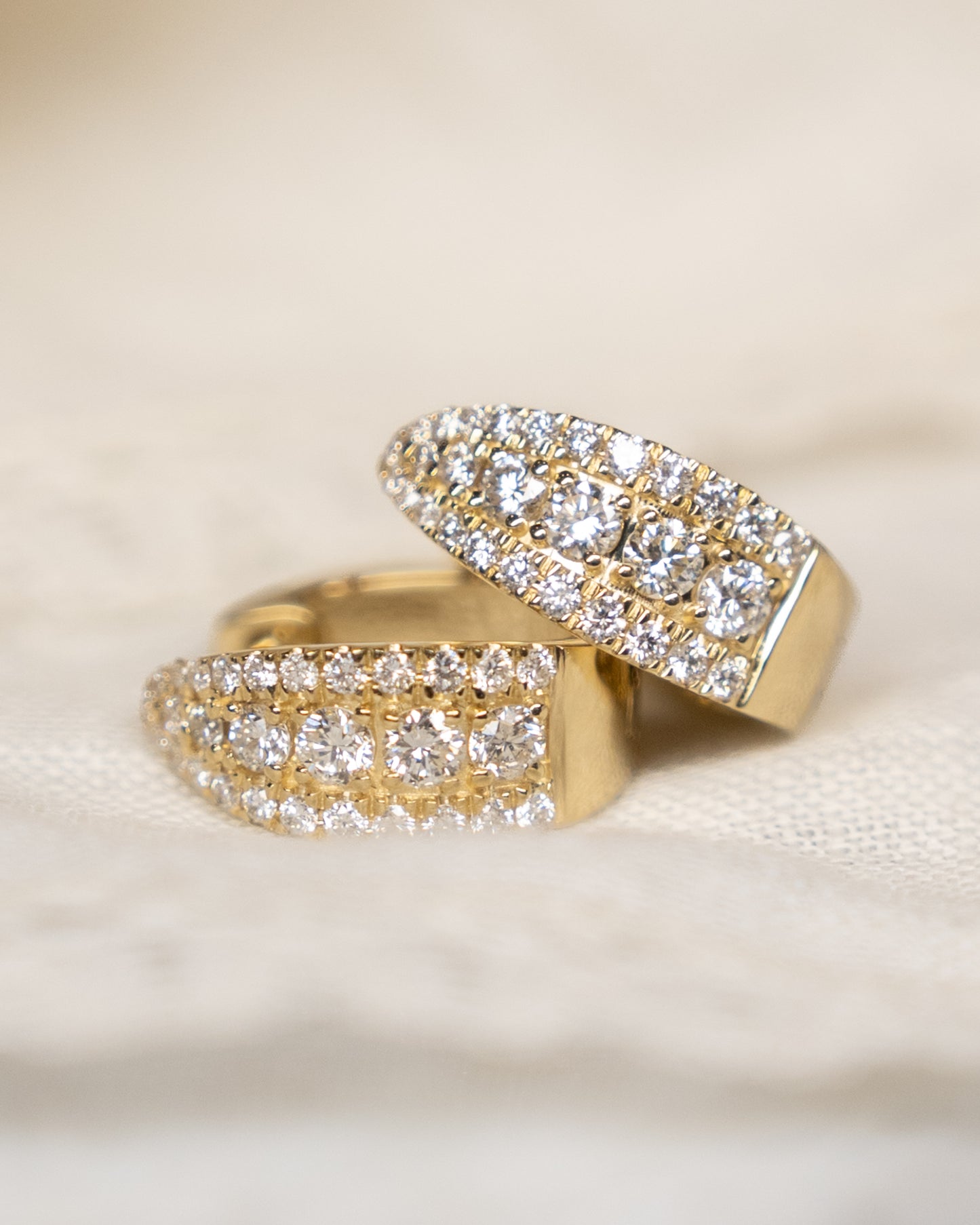 .64 Diamond Huggie Hoop Earrings in 14k