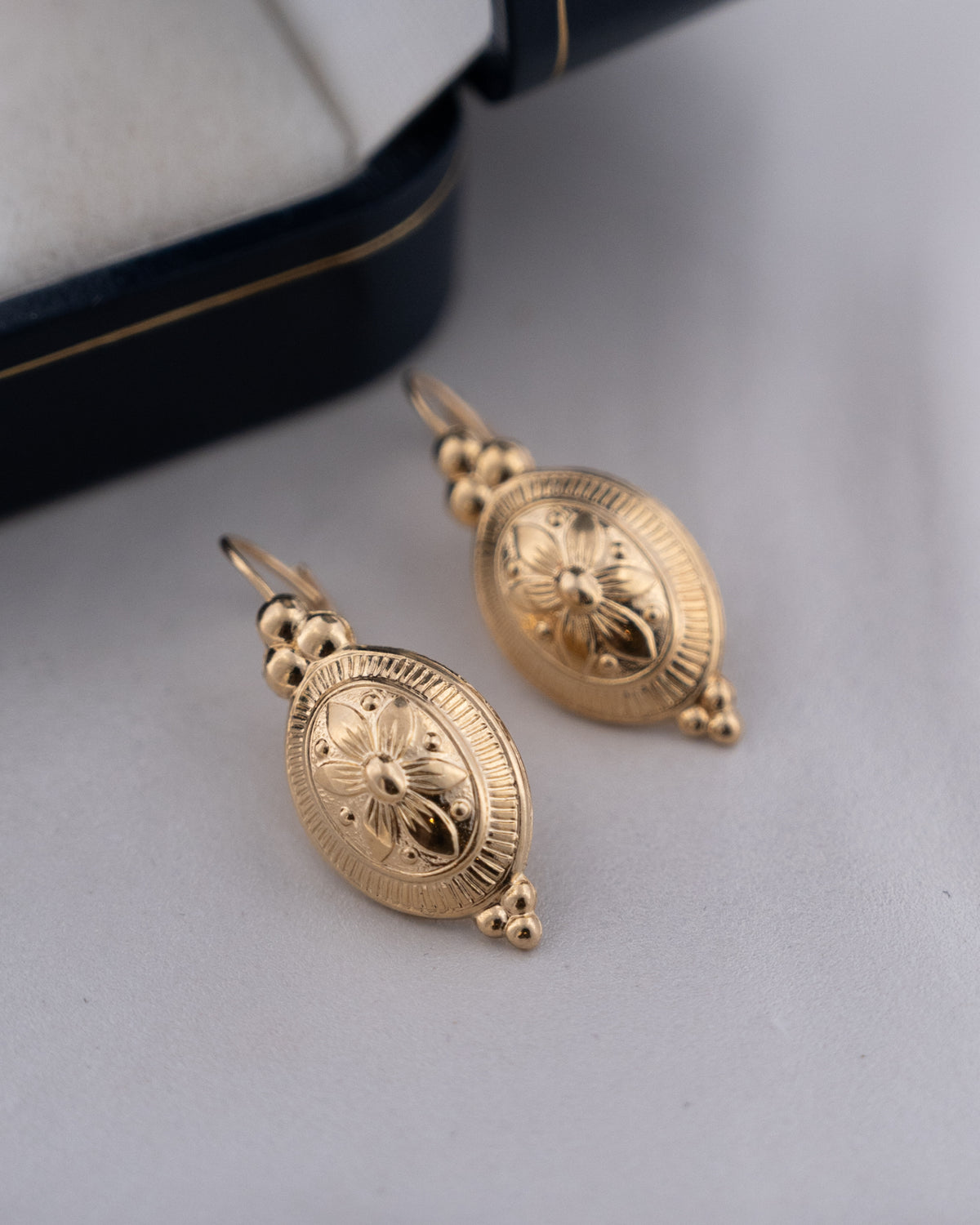 Oval Flower Engraved Drop Earrings 14k Yellow Gold