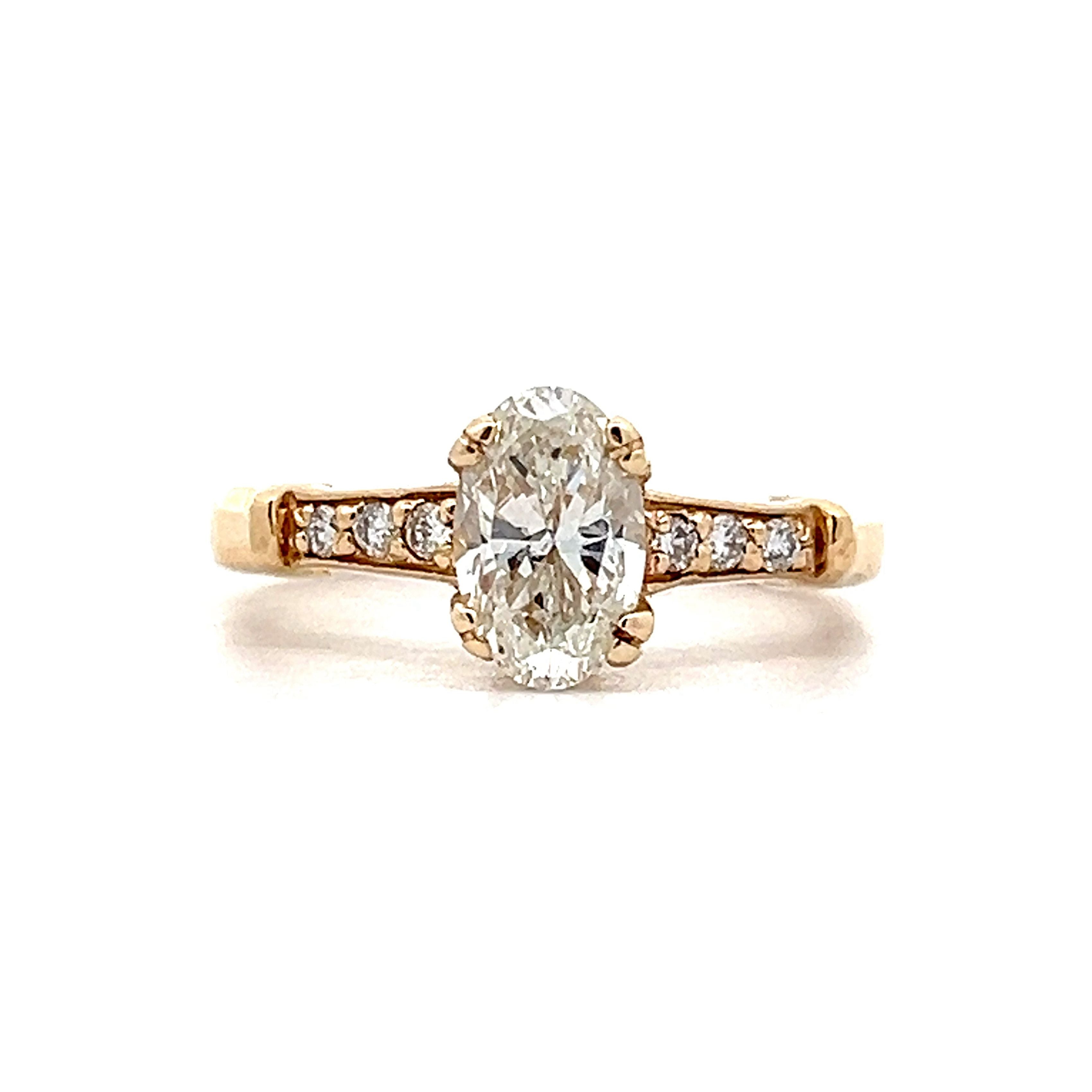 18ct Yellow and White Gold Oval Cut Diamond Engagement Ring main image 1
