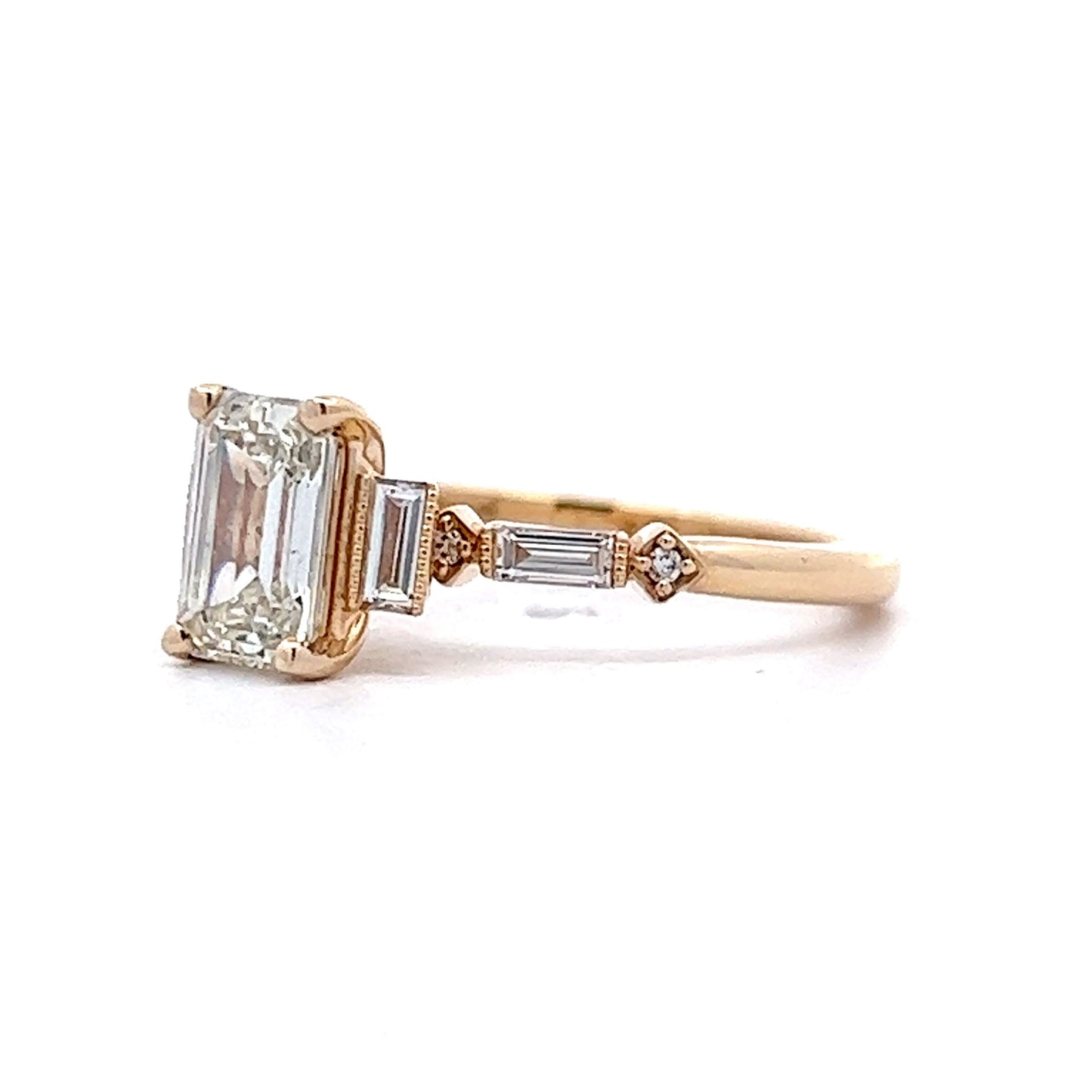 1.09 Emerald Cut Three Stone Engagement Ring in 14k Yellow Gold