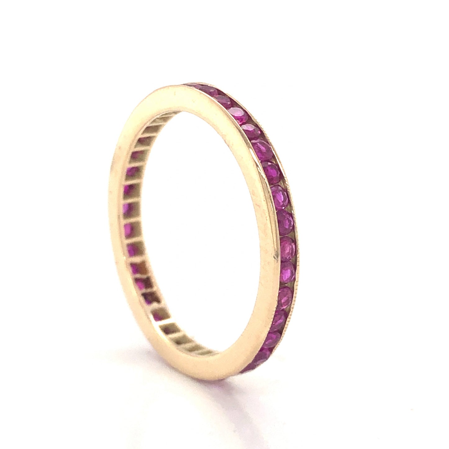 Channel Set Round Ruby Eternity Band in 14k Yellow Gold