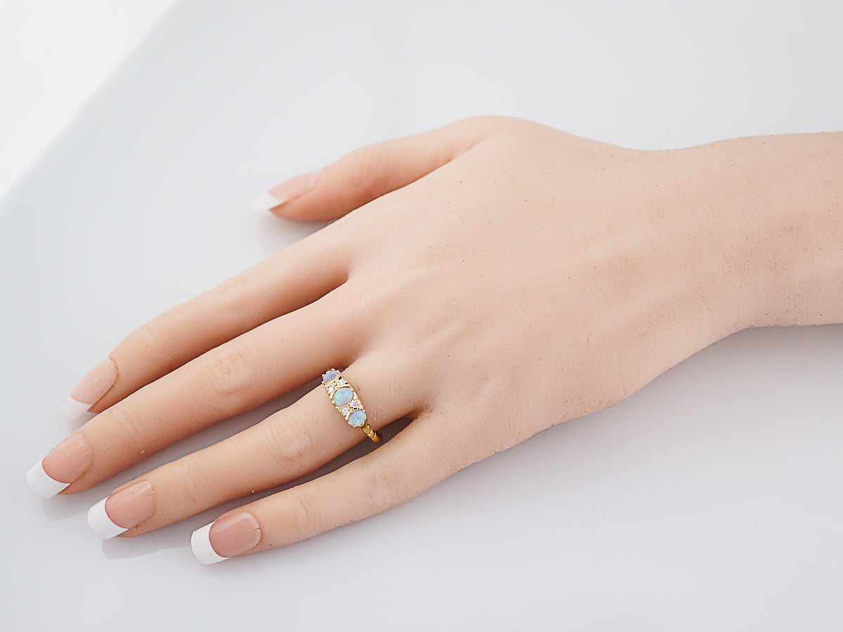 Antique Right Hand Ring Victorian .35 Oval Cabochon Cut Opal & .04 Round Brilliant Cut Diamonds in 18k Yellow Gold