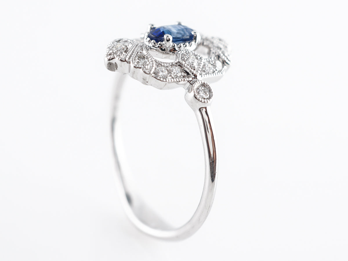 Antique Style Oval Sapphire & Diamond Ring in 18k