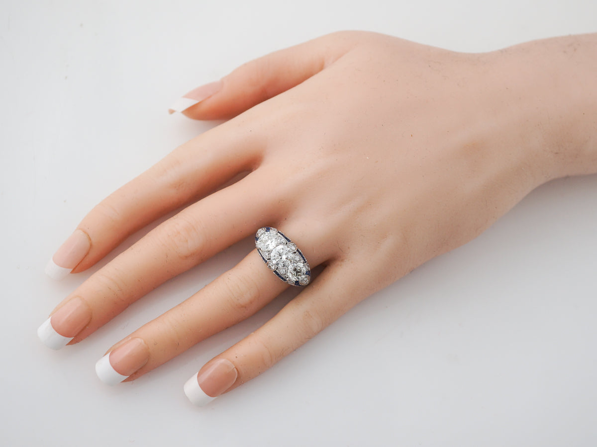 Antique Three Stone Diamond & Sapphire Ring in Platinum