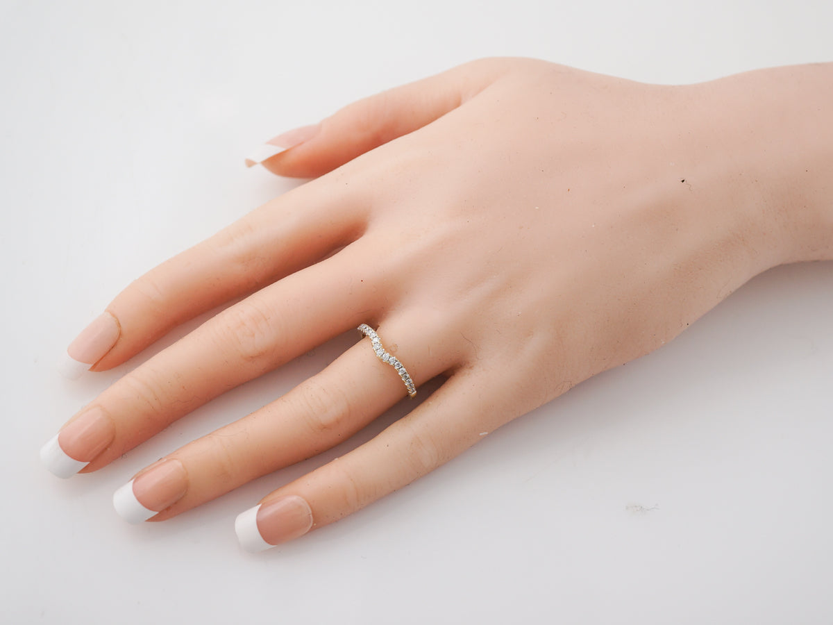 .25 Diamond Curved Wedding Band in Yellow Gold