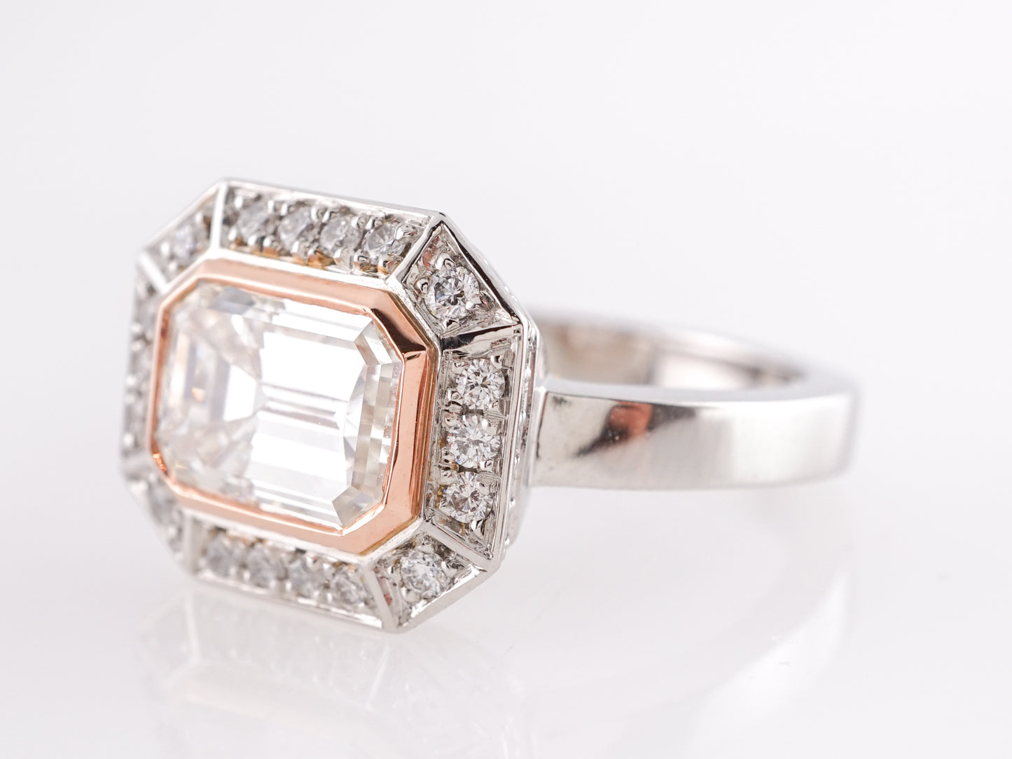 Emerald Cut Diamond Engagement Ring in Platinum and Rose Gold