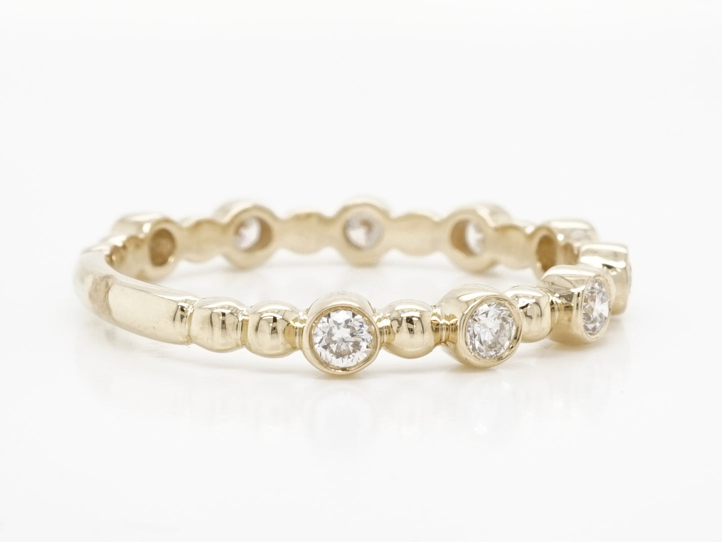 .27 Bezel Set Diamond Wedding Band in 14k Yellow Gold