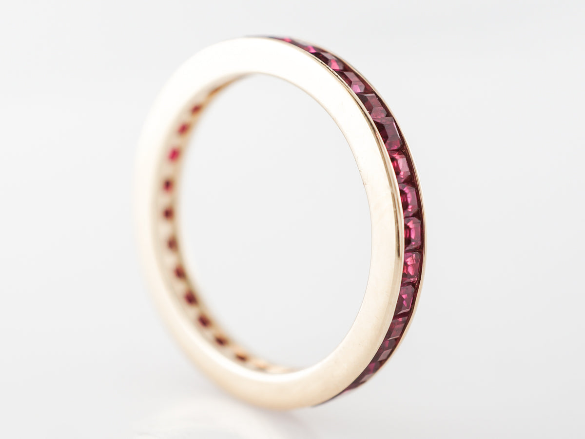 Ruby Eternity Wedding Band in 14k Yellow Gold