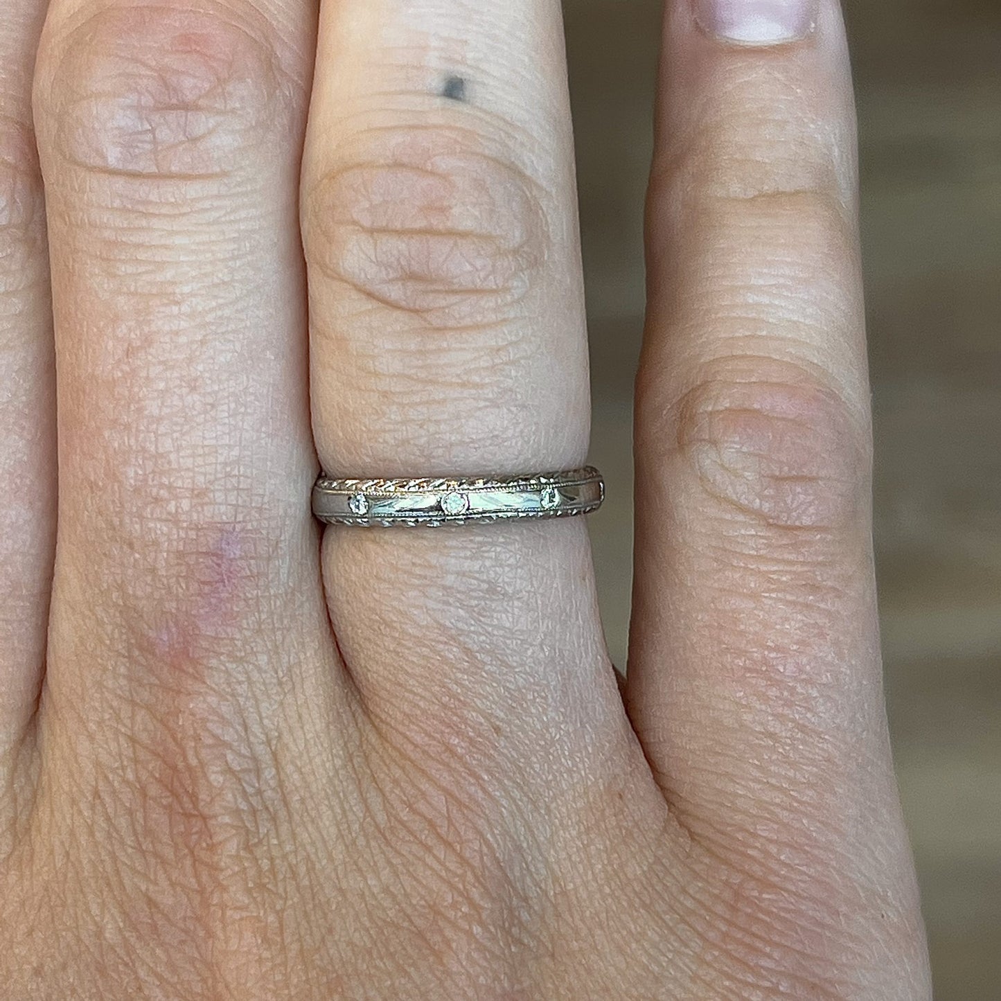 Antique Inspired Flush Set Diamond Wedding Band in Platinum