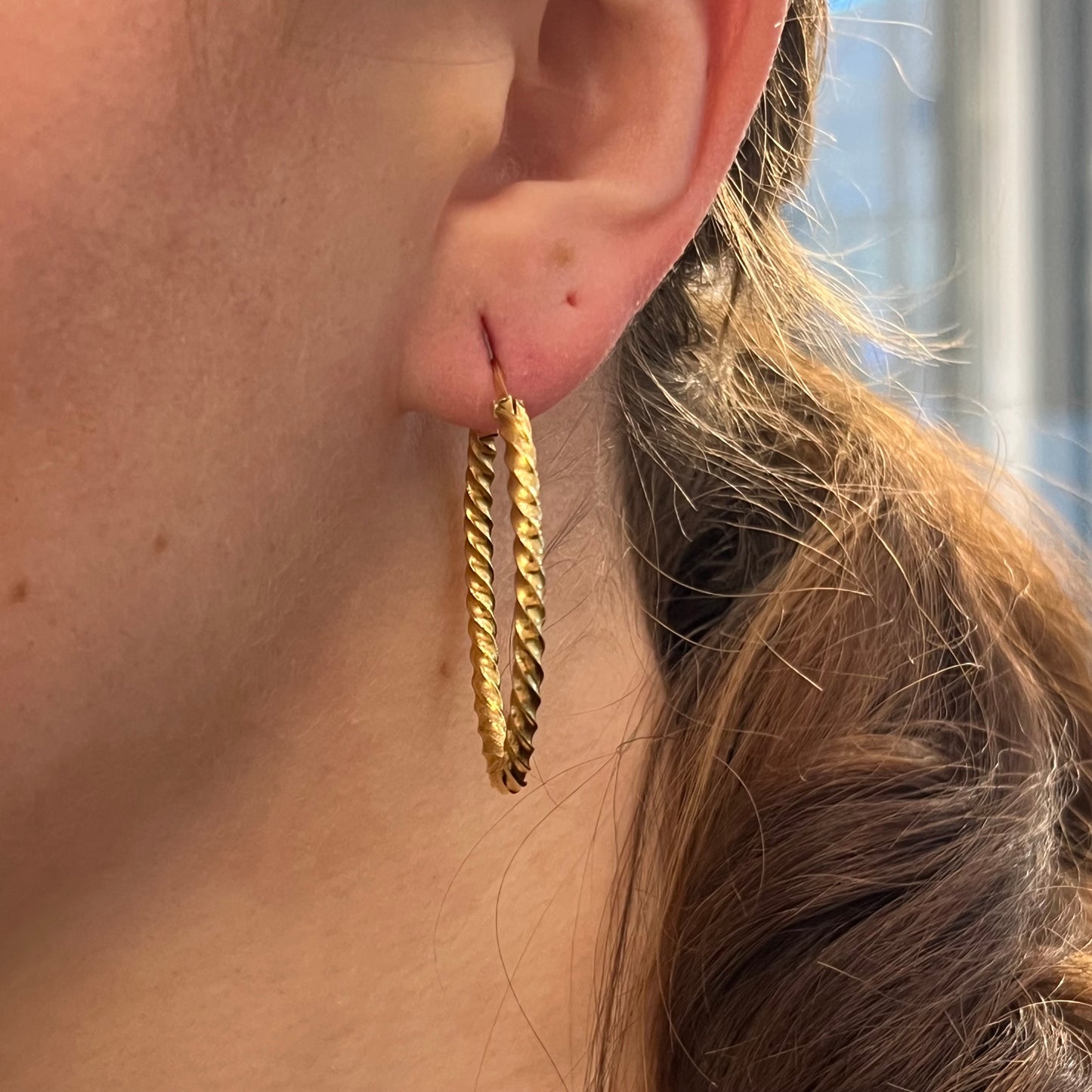 Twisted Oval Hoop Earrings in 18k Yellow Gold