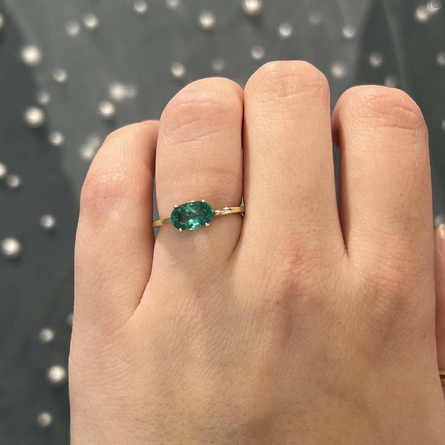 Solitaire Oval Cut Emerald Ring in 14k Yellow Gold