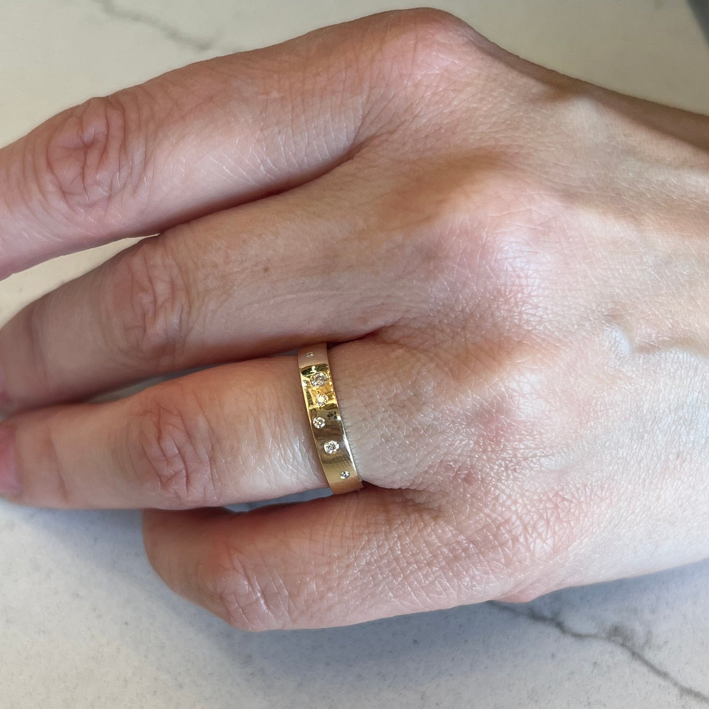 .07 Flush Set Diamond Wedding Band in 14k Yellow Gold