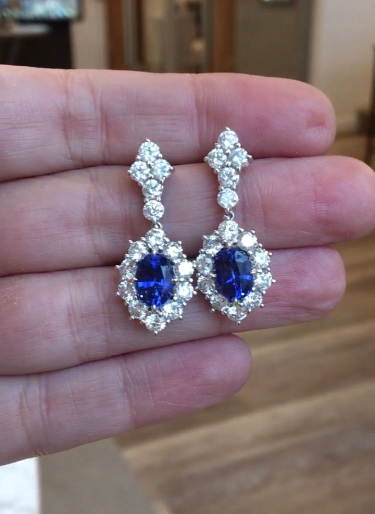 Oval Cut Sapphire & Diamond Drop Earrings in White Gold