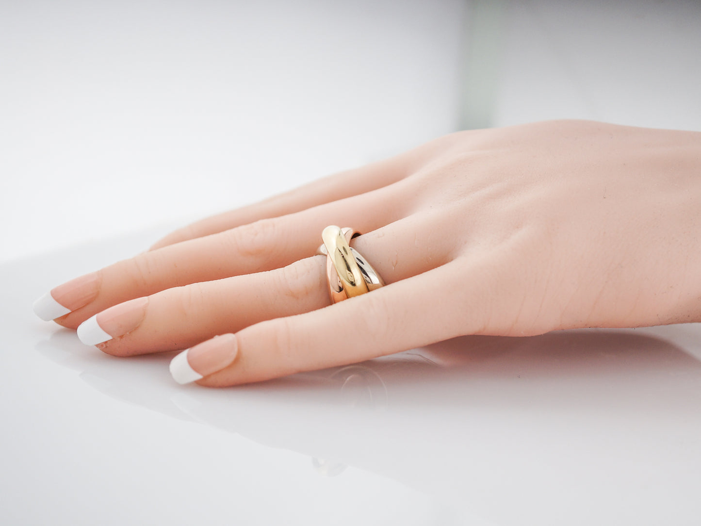 Modern Cartier Trinity Roll Ring in 18k Yellow, White, & Rose Gold