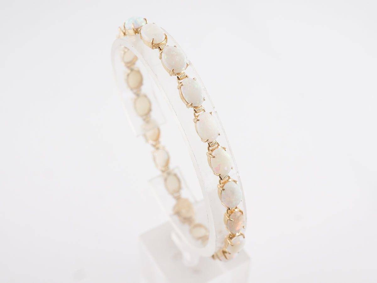 Cabochon Cut Opal Bracelet in 14k Yellow Gold