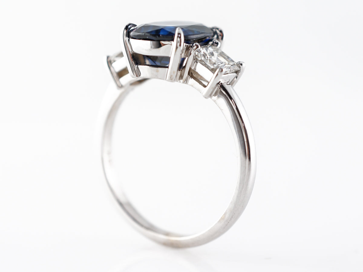 Oval Cut Sapphire w/ Diamonds Engagement Ring in 18k