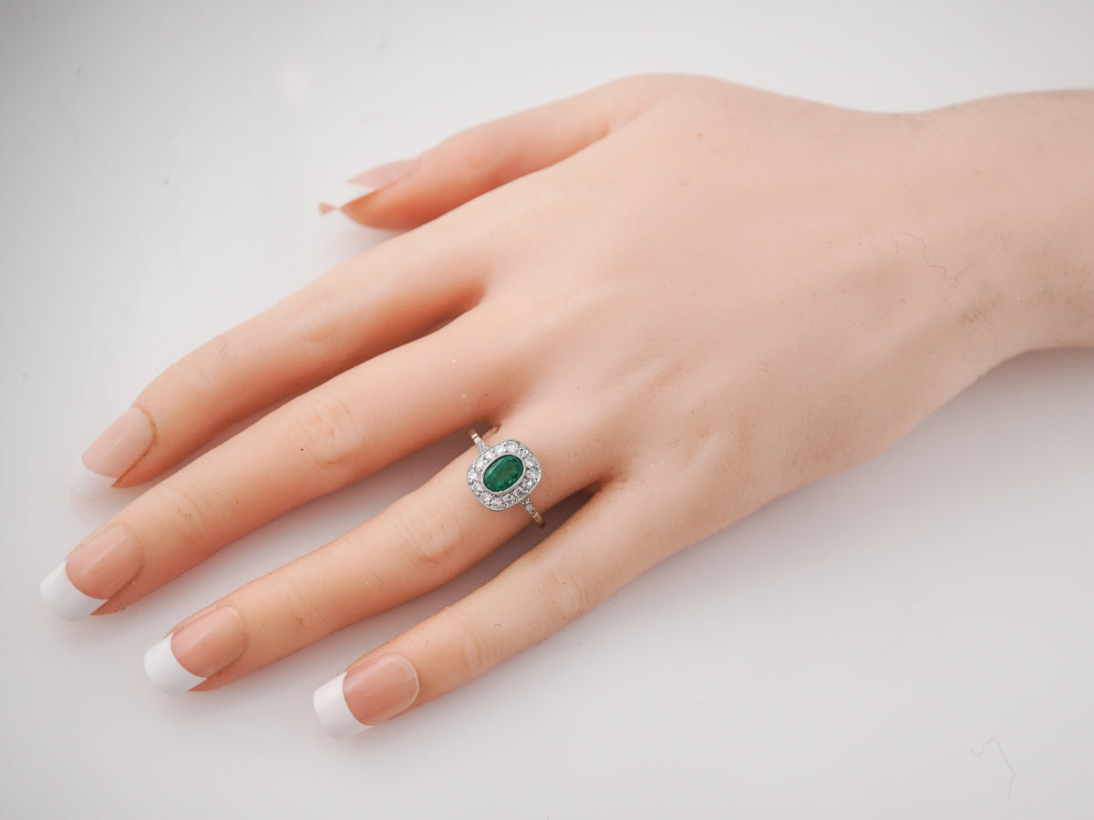 Oval Cut Emerald & Diamond Right Hand Ring in Platinum