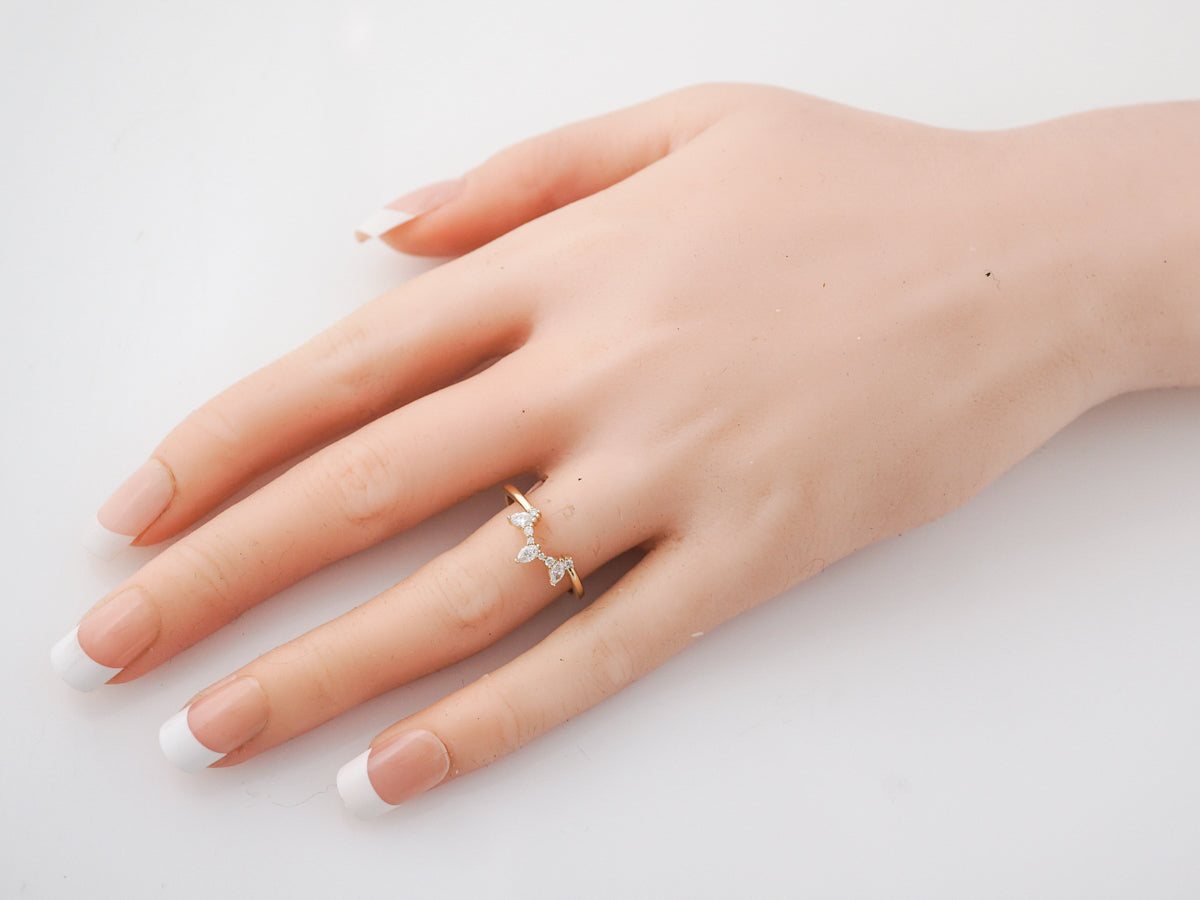 Marquise Cut Diamond Curved Wedding Band in Yellow Gold