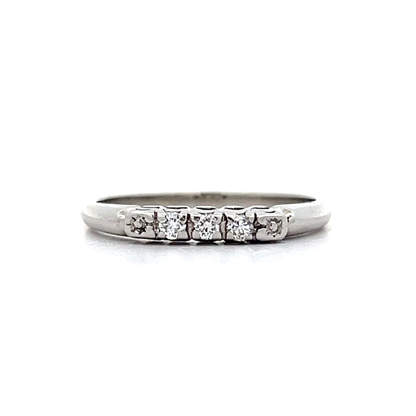 .09 Vintage Mid-Century Three Stone Band in Platinum