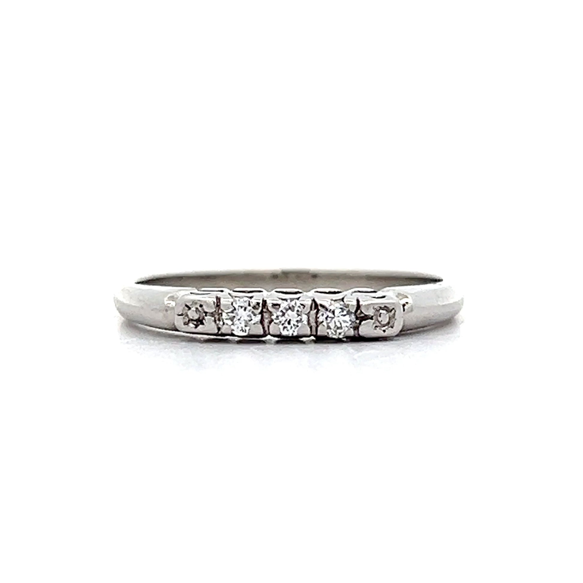 .09 Vintage Mid-Century Three Stone Band in Platinum