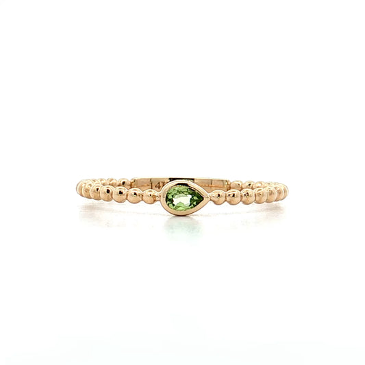 .10 Pear Cut Peridot Stacking Ring 14k Yellow Gold