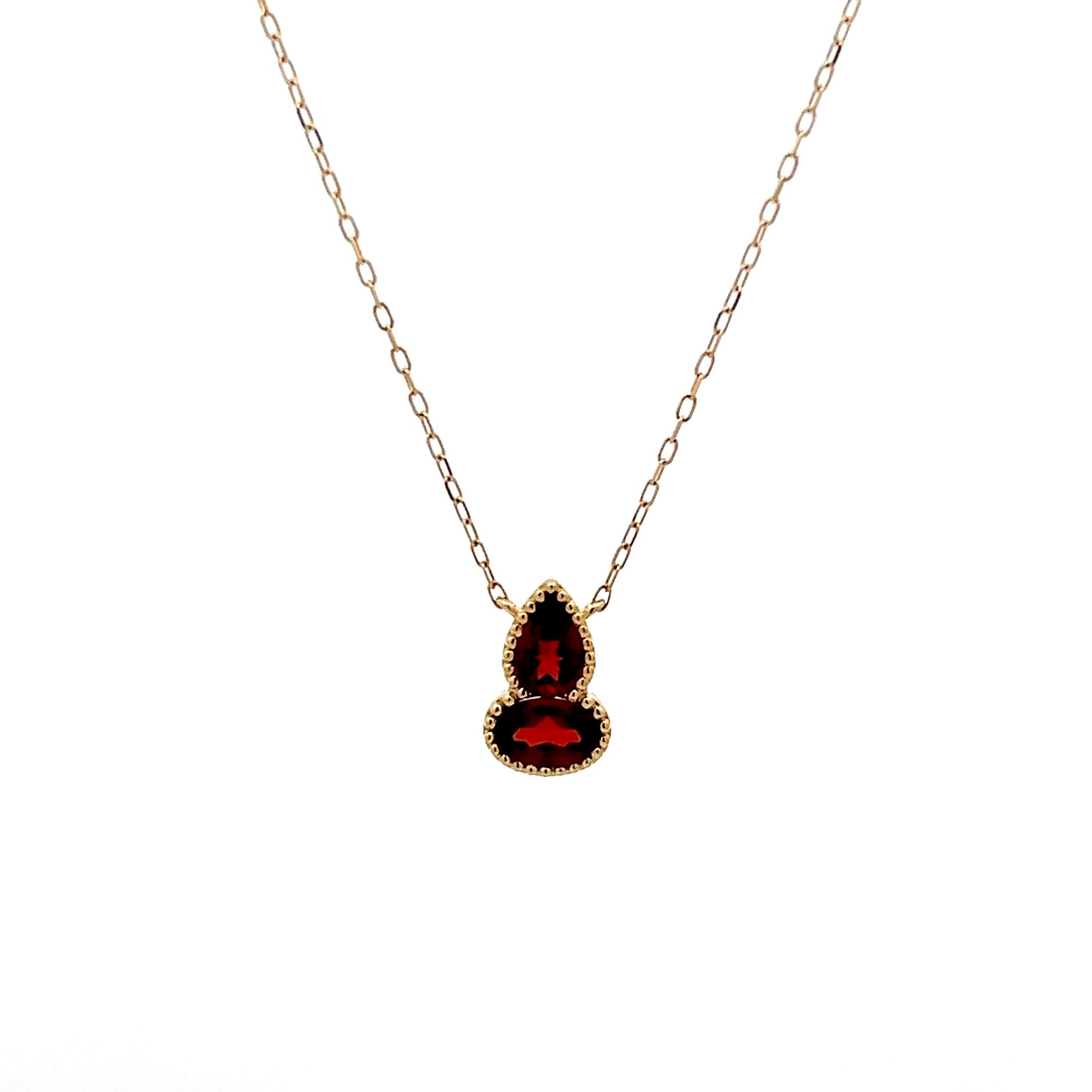 1.06 Red Garnet Bezel Pendant in 14k Yellow Gold