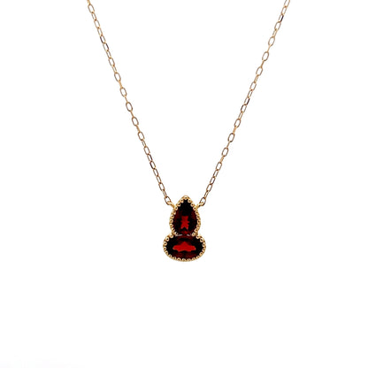 1.06 Red Garnet Bezel Pendant in 14k Yellow Gold