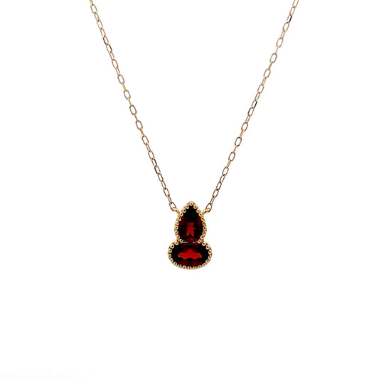 1.06 Red Garnet Bezel Pendant in 14k Yellow Gold
