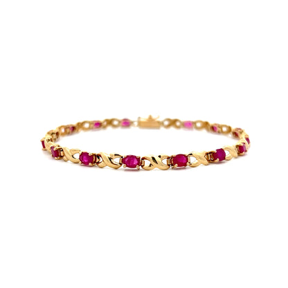 2.55 Oval Ruby Chain Bracelet in 14k Yellow Gold