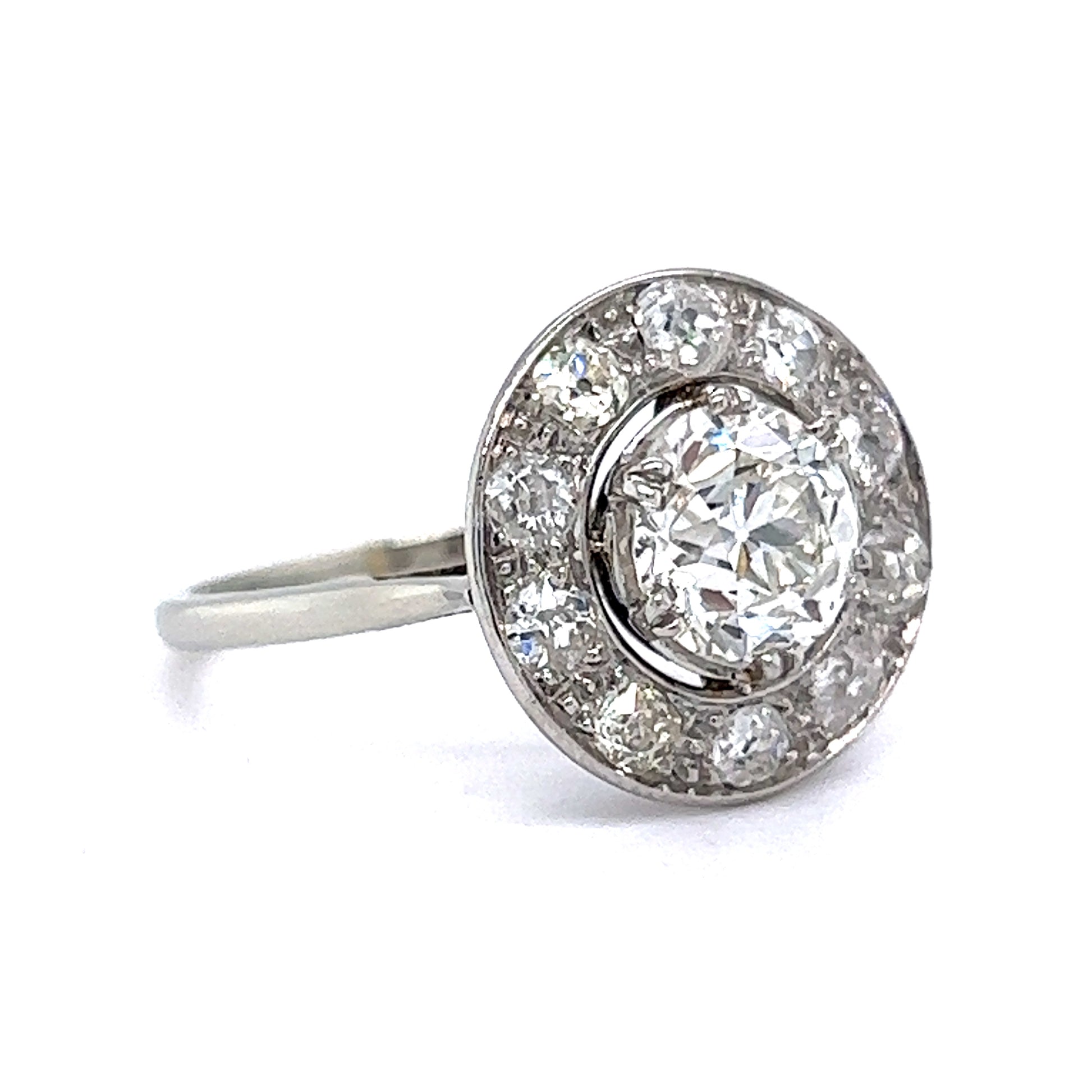 1.51 Old European Diamond Halo Ring in Platinum & White GoldComposition: 18 Karat White Gold/PlatinumRing Size: 8.0Total Diamond Weight: 2.31 ctTotal Gram Weight: 4.1 g