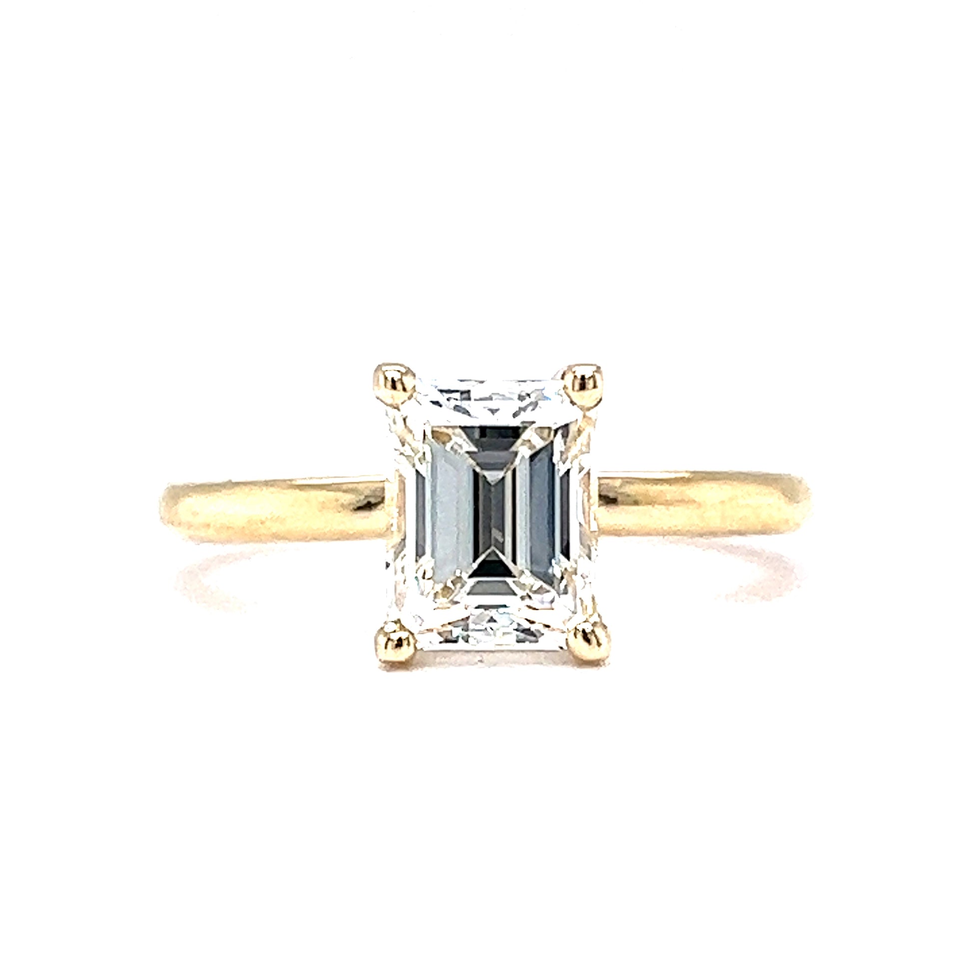 1.61 Emerald Cut Diamond Engagement Ring in 14k Yellow GoldComposition: 14 Karat Yellow Gold Ring Size: 7.0 Total Diamond Weight: 1.61ct Total Gram Weight: 3.05 g Inscription: 14k
      