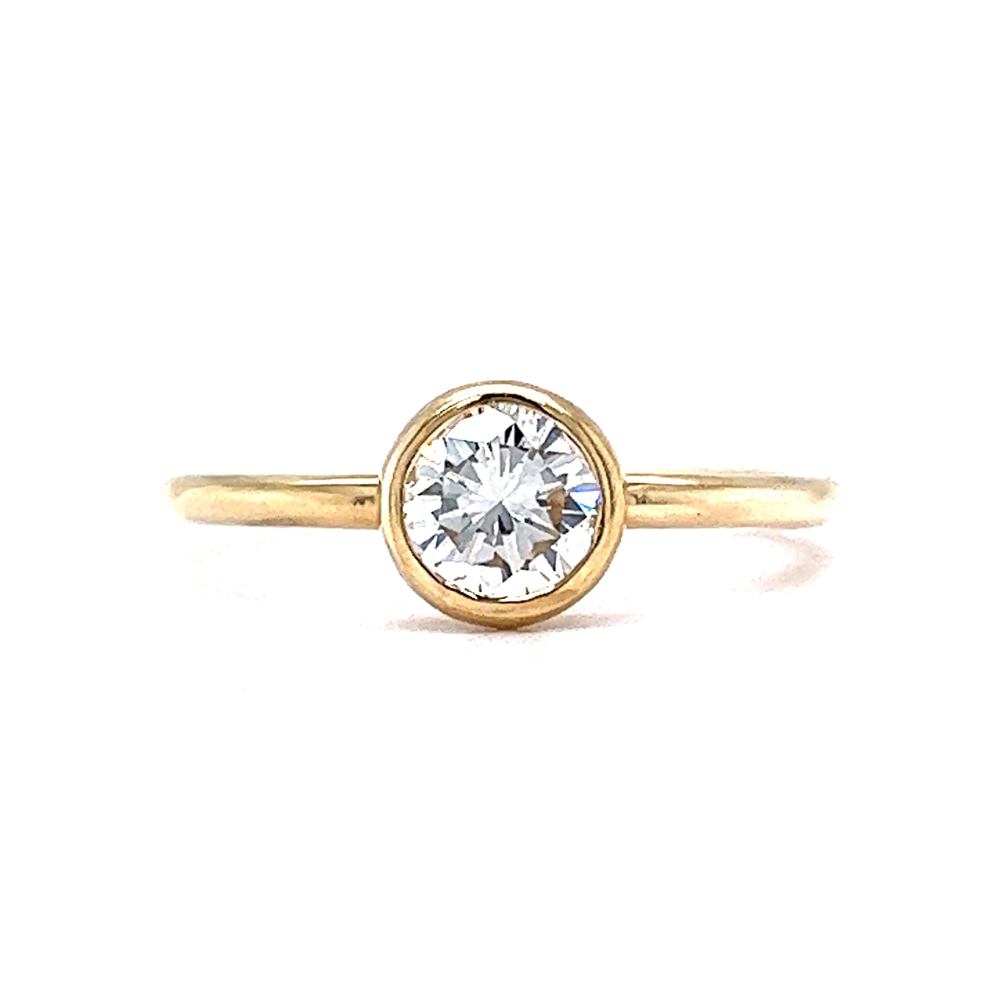 .72 Round Brilliant Bezel Engagement Ring in 14k Yellow GoldComposition: 14 Karat Yellow GoldRing Size: 7.0Total Diamond Weight: .72 ctTotal Gram Weight: 2.5 gInscription: 14k