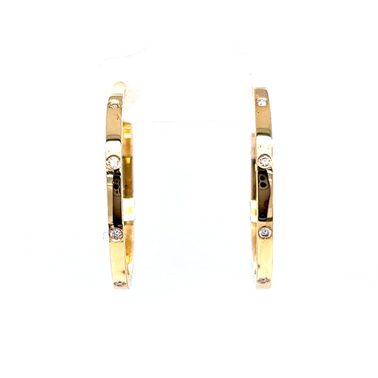 .08 Diamond Hoop Earrings in 14k Yellow Gold