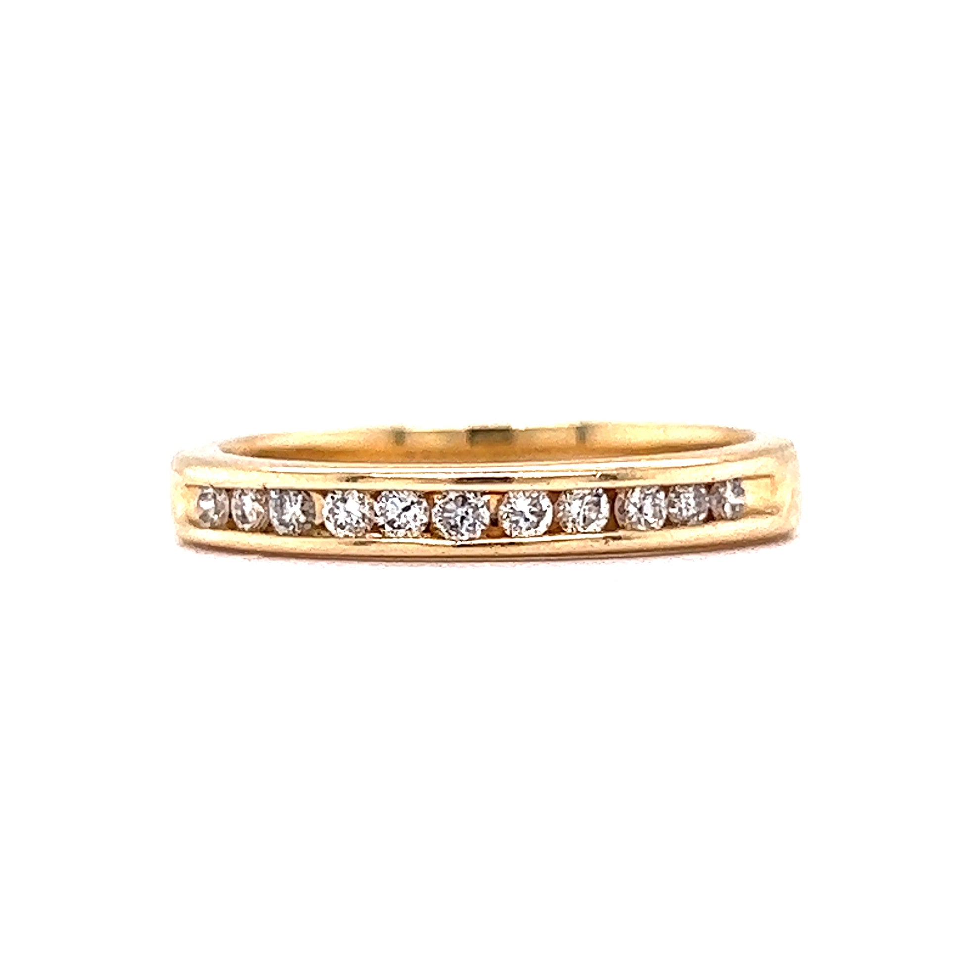 .22 Channel Set Diamond Wedding Band in 14k Yellow GoldComposition: 14 Karat Yellow Gold Ring Size: 7 Total Diamond Weight: .22ct Total Gram Weight: 2.9 g Inscription: 14k
      