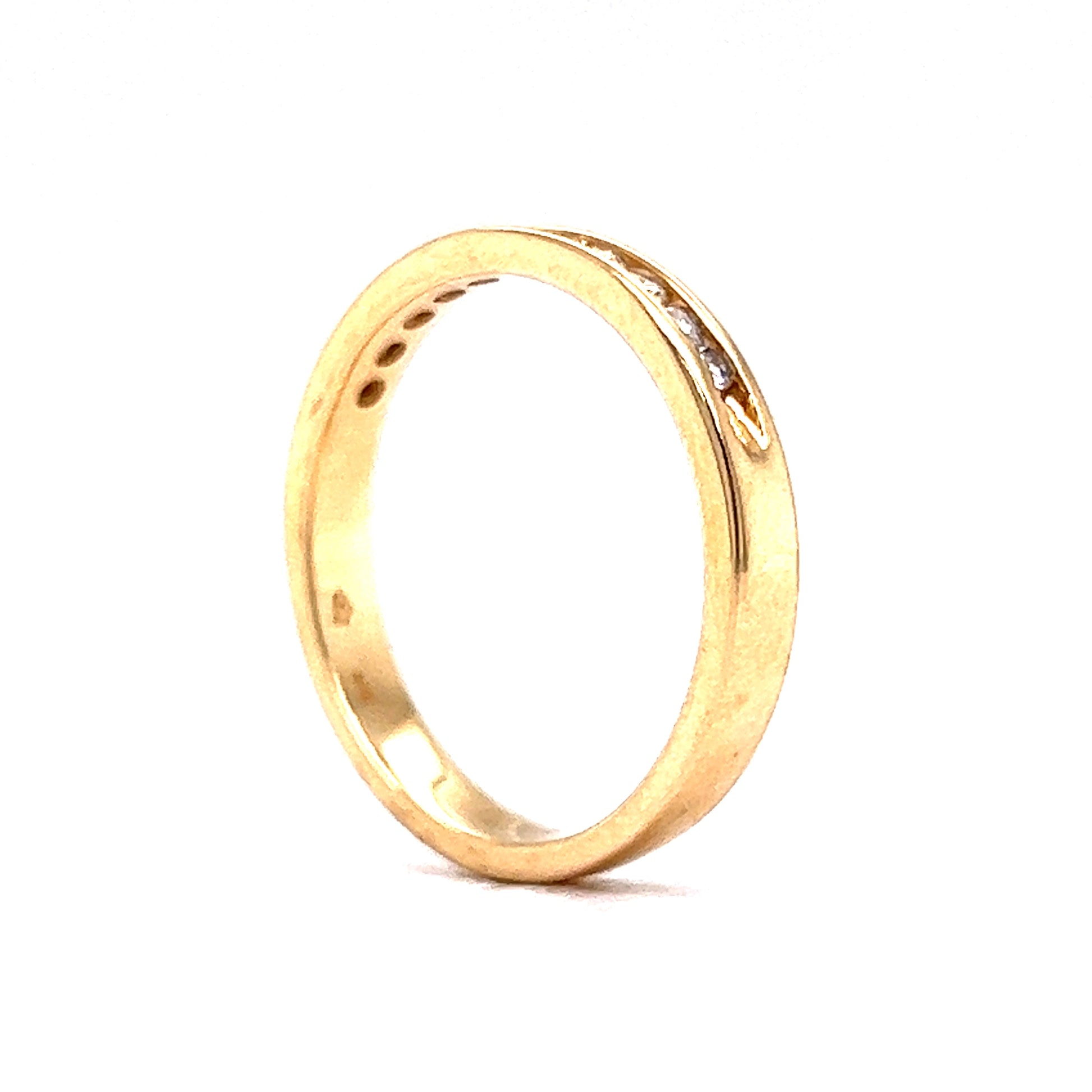 .22 Channel Set Diamond Wedding Band in 14k Yellow GoldComposition: 14 Karat Yellow Gold Ring Size: 7 Total Diamond Weight: .22ct Total Gram Weight: 2.9 g Inscription: 14k
      