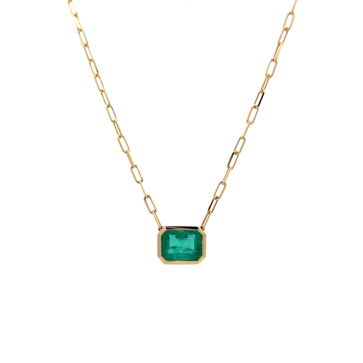 4.12 Emerald Cut Emerald in 14k Yellow Gold