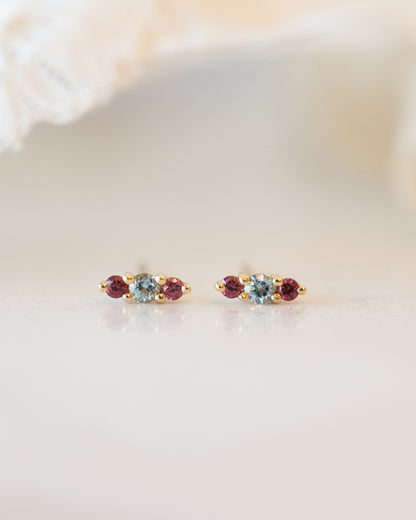 Blue Topaz & Garnet Stud Earrings in 14k Yellow Gold