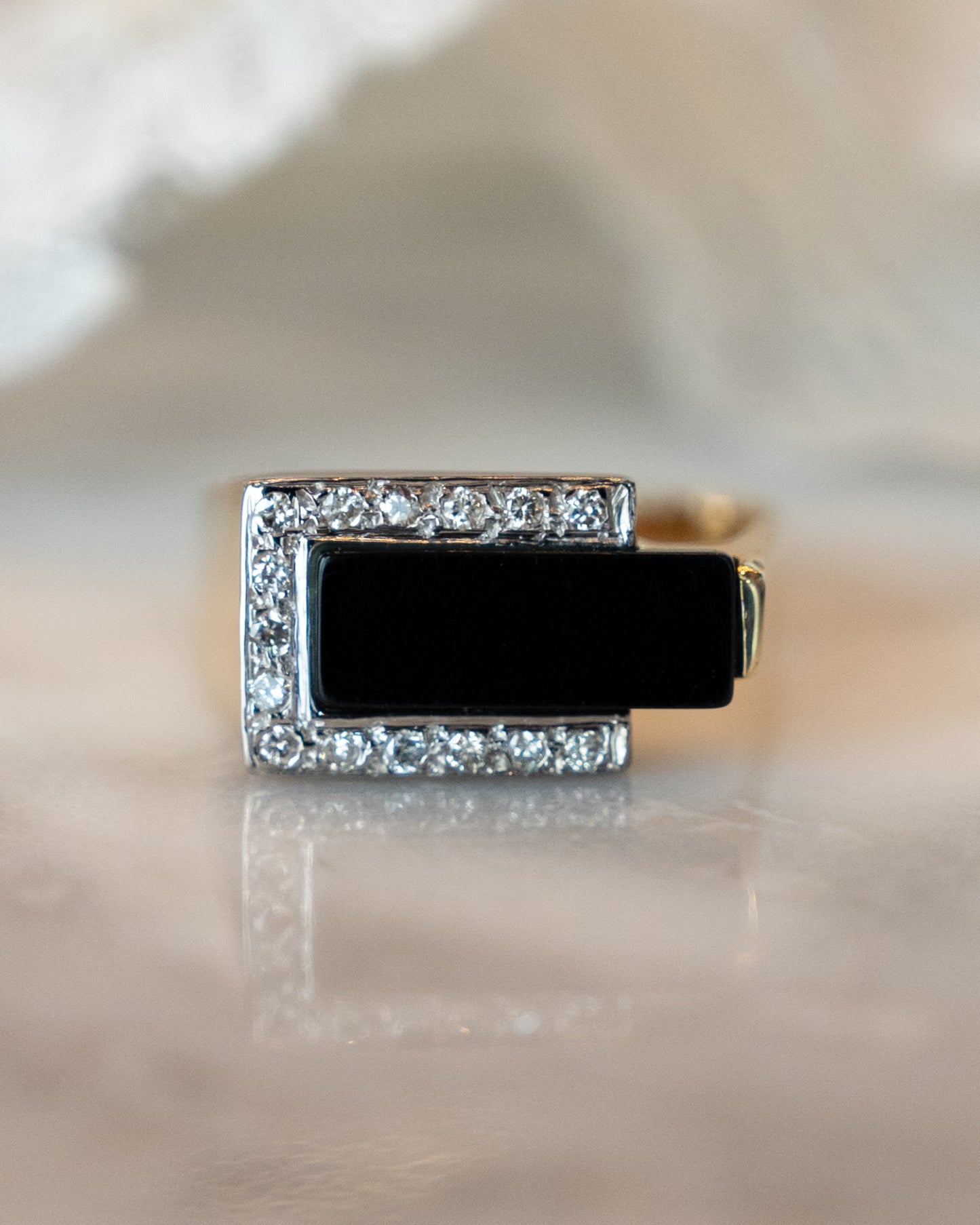 Modern Black Onyx and Diamond ring in 14k Yellow Gold