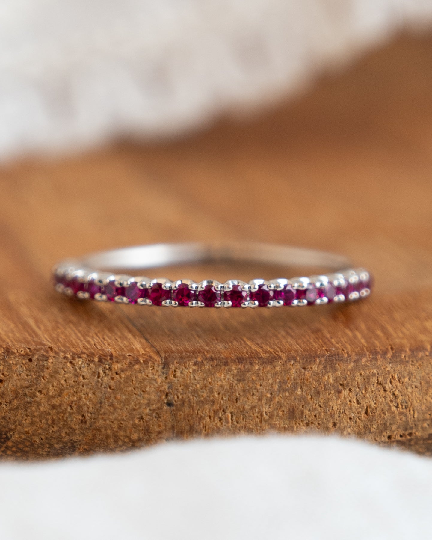 .19 Round Cut Ruby Wedding Band in 18k White Gold