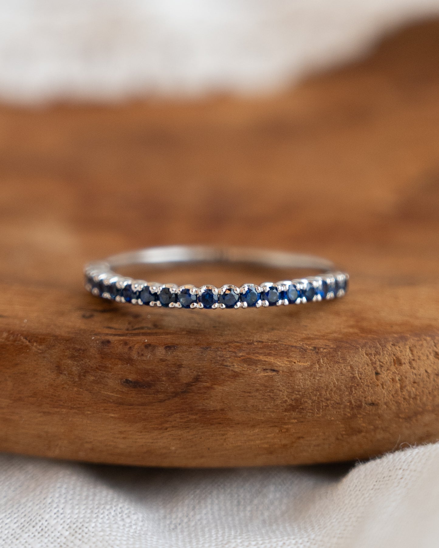 .28 Round Cut Blue Sapphire Wedding Band in 18k