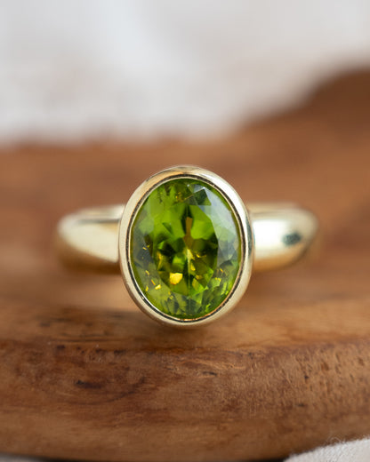 4 Carat Oval Peridot Cocktail Ring in 18k Yellow Gold