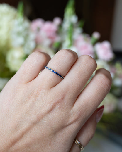 .28 Round Cut Blue Sapphire Wedding Band in 18k
