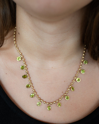11.39 Peridot Dangle Necklace in 14k Yellow Gold