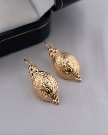 Oval Flower Engraved Drop Earrings 14k Yellow Gold