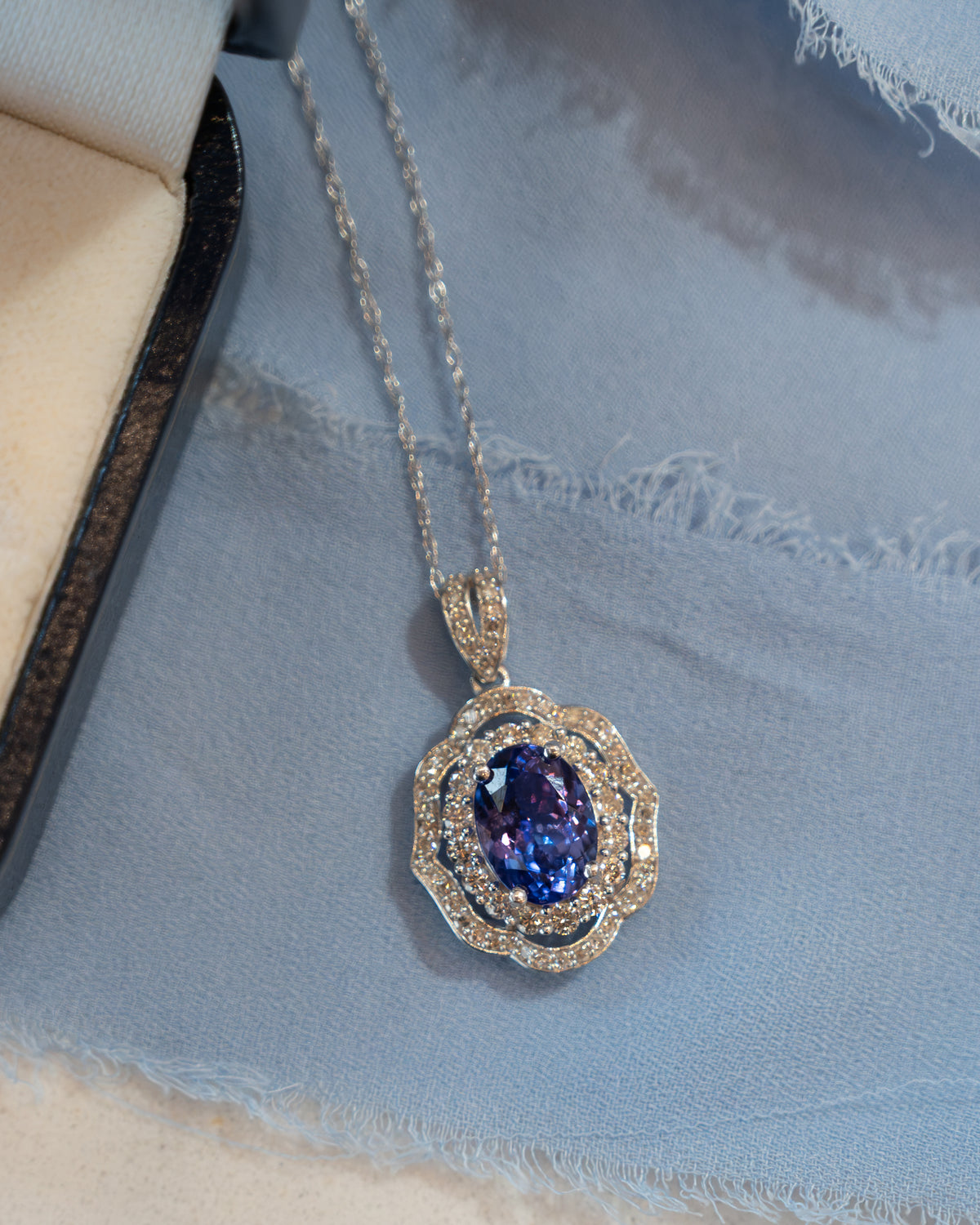 2.51 Oval Tanzanite & Diamond Halo Pendant 14k