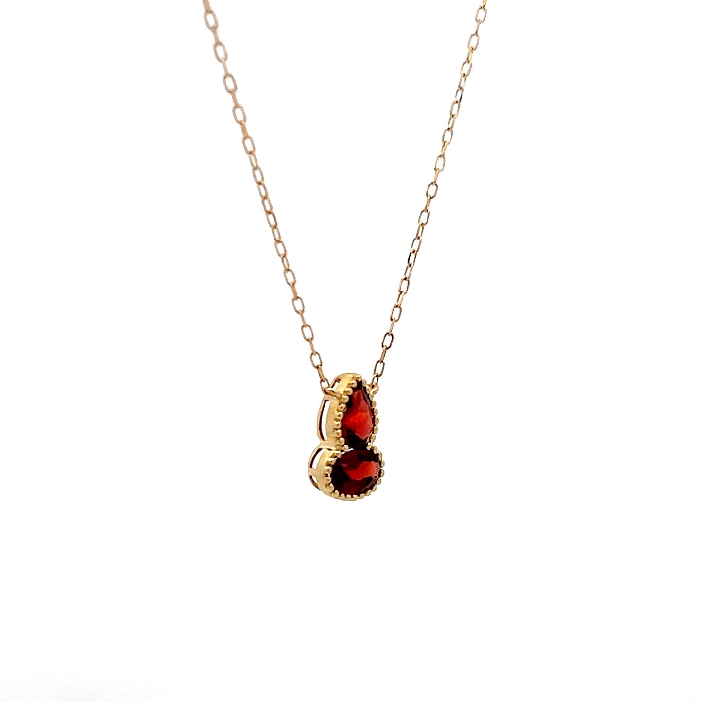 1.06 Red Garnet Bezel Pendant in 14k Yellow Gold