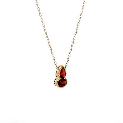 1.06 Red Garnet Bezel Pendant in 14k Yellow Gold